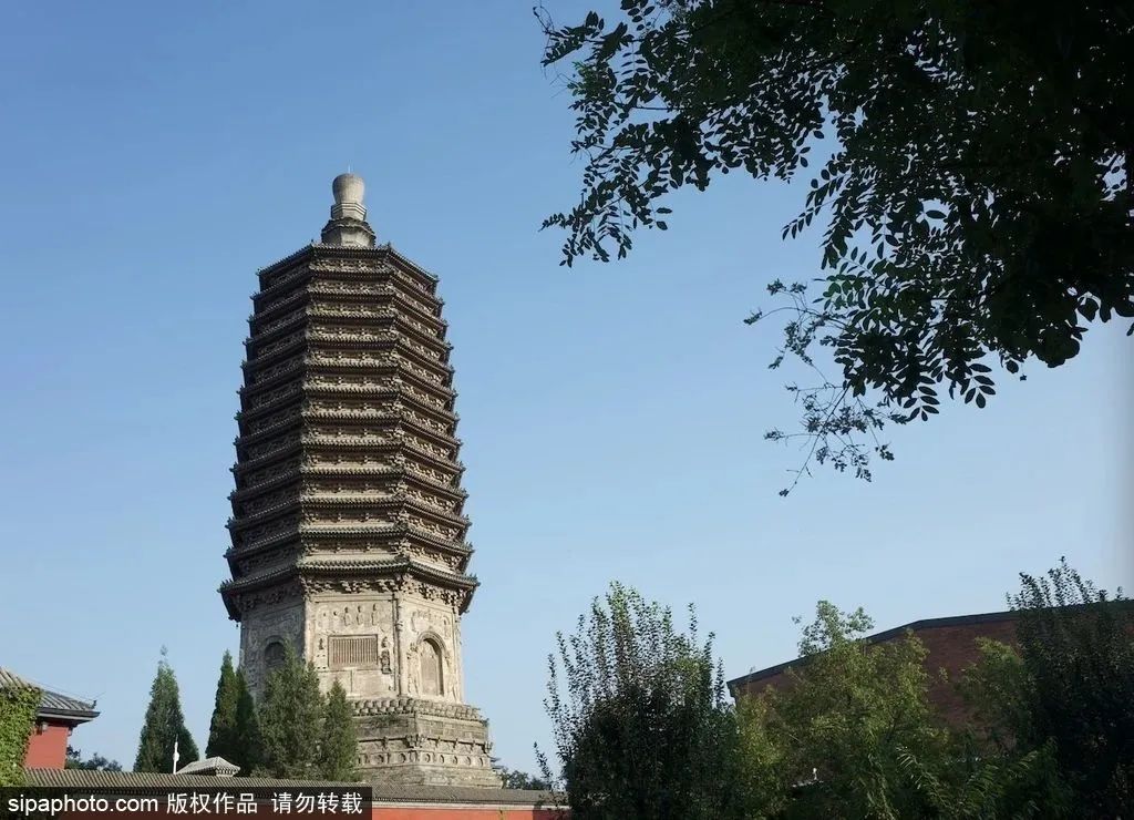 Gathering under giant chimney and thousand-year-old pagoda